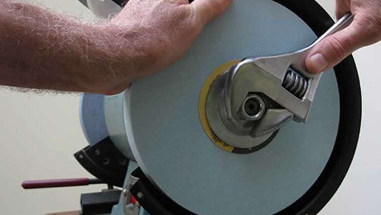 How do you modify the grinding wheels?