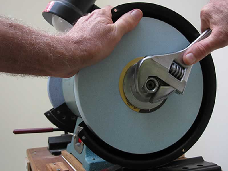 How do you modify the grinding wheels?